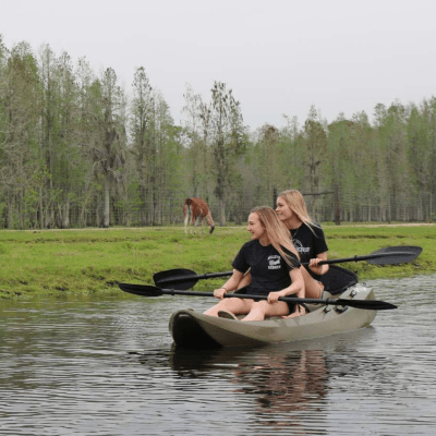 a man rowing a boat in the water